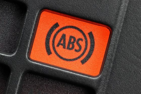 Close up of the ABS indicator on a car dashboard