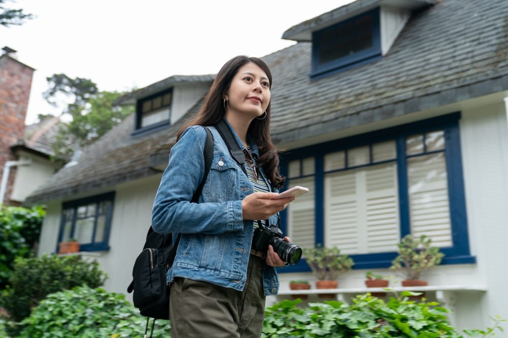 Young Asian American girl walks California neighborhoods looking for housing