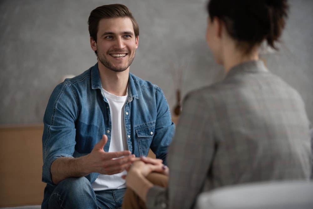 Smiling man finds health insurance in California after his Medicaid ends