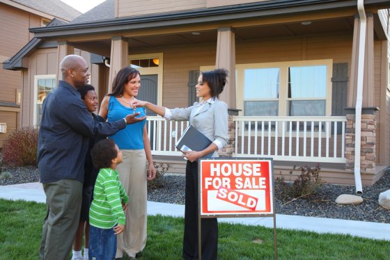 Multi-racial family gets keys to their new home