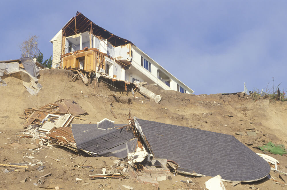 A home in Palisades, California teetering on a cliff after an earthquake.