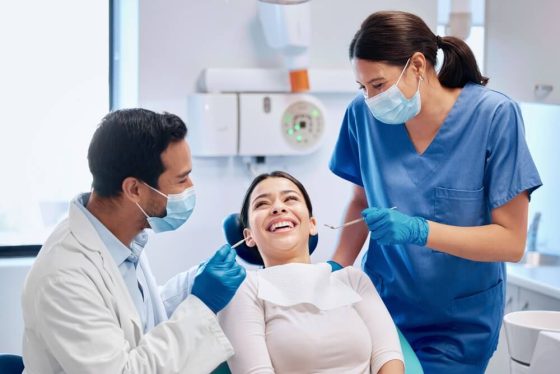 Woman, doctor and dentist with patient in clinic for consultation on medical advice hygiene for dental care or cleaning.