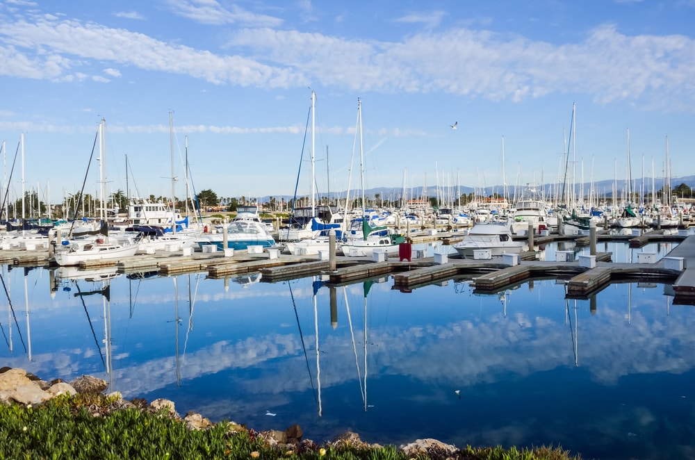 Boats dock and marina with reflection at harbor in Oxnard, California