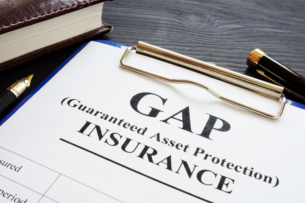 clipboard with gap insurance document