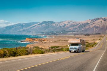 rv driving down highway in california