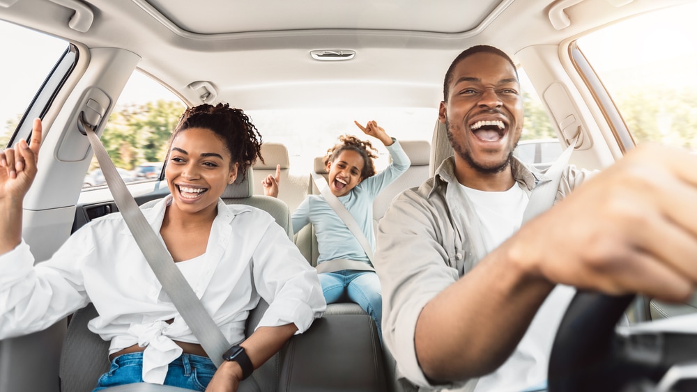 family on road trip in car