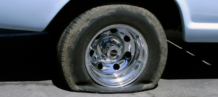 A flat tire on a car