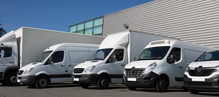 A variety of specialized delivery small trucks and van.