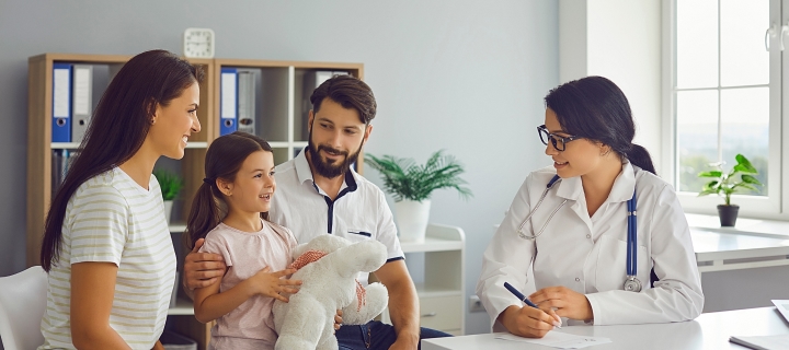 Family meets with pediatrician.