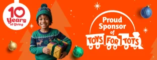 Child holding toys, festive background.